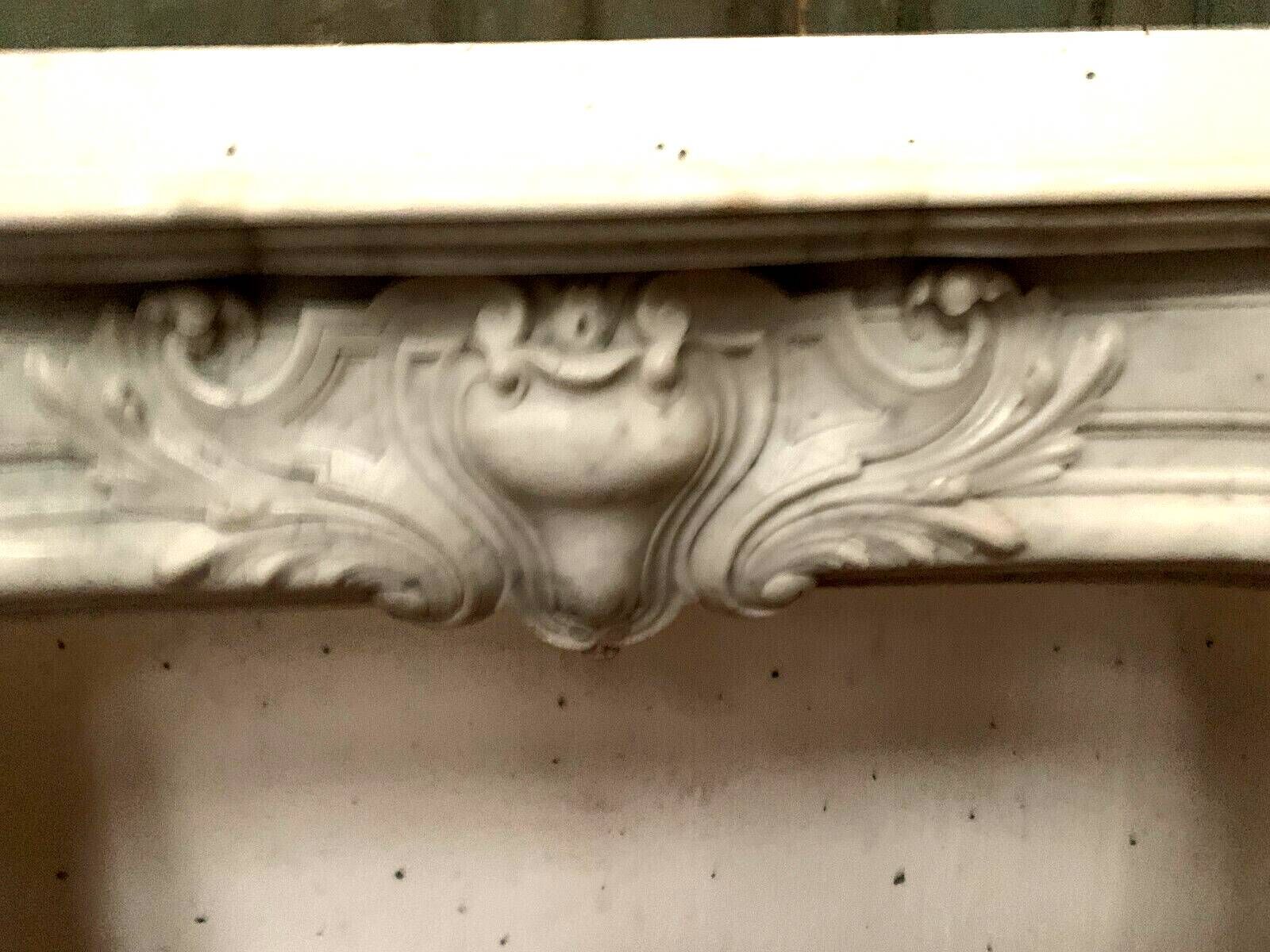 Regency style fireplace in white Carrara marble, Italy, 19th century.