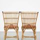 Set of 4 subtle and charming vintage 60s rattan boho chairs with colorful upholstered seats