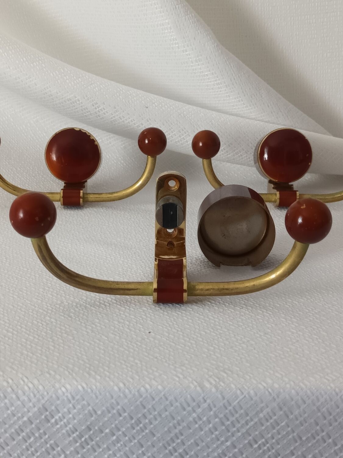 Art deco bakelite brass hooks