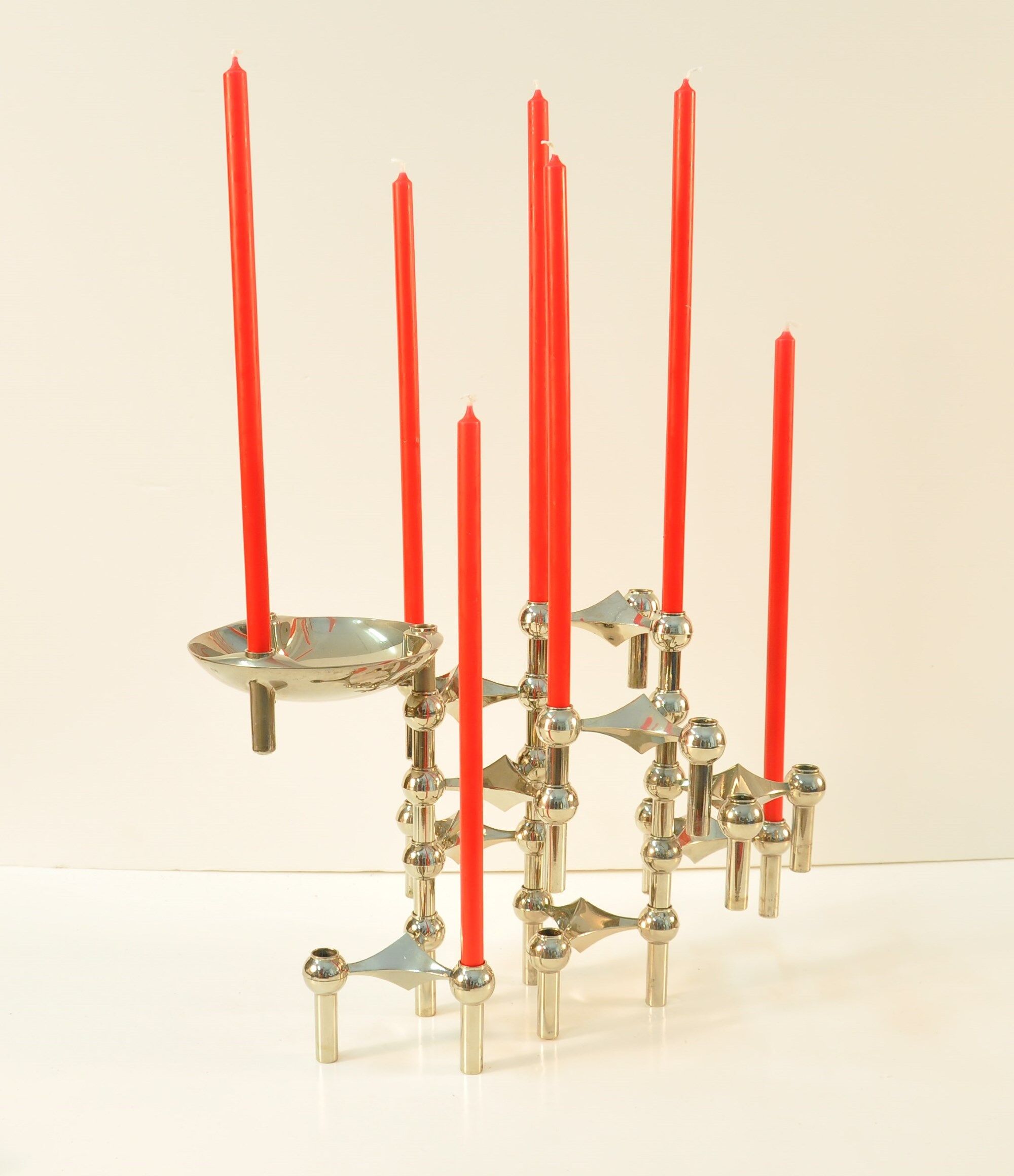 9 candlesticks and a Nagel Cup
