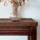 Vintage wooden wheeled side table/console.