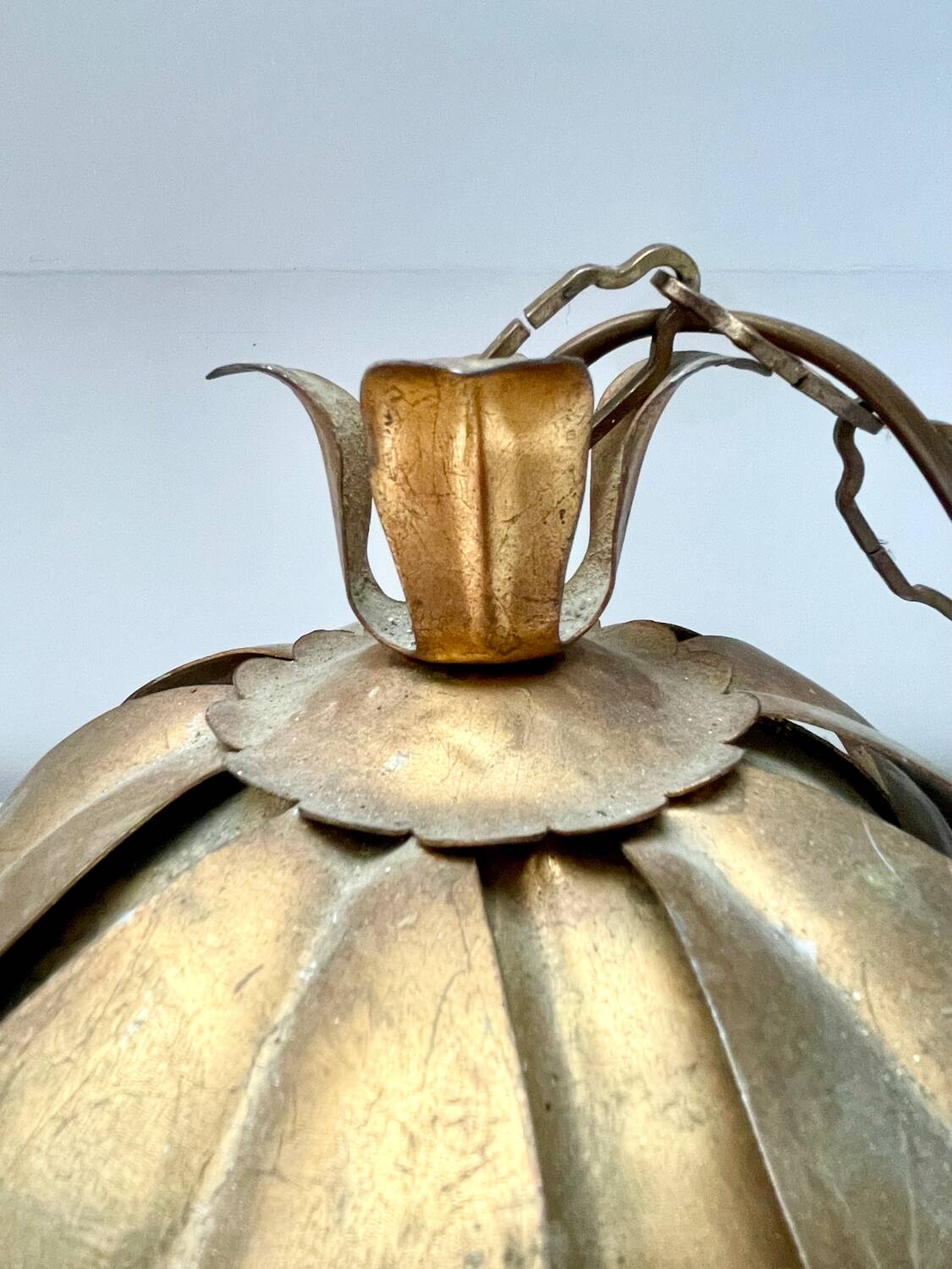 Two vintage pendant lights in gold metal