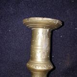 Former pair of bronze candlesticks
