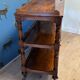antique mahogany three-tiered étagère