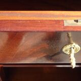 Flamed mahogany enfilade with sea green marble in Empire style.