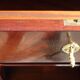Flamed mahogany enfilade with sea green marble in Empire style.
