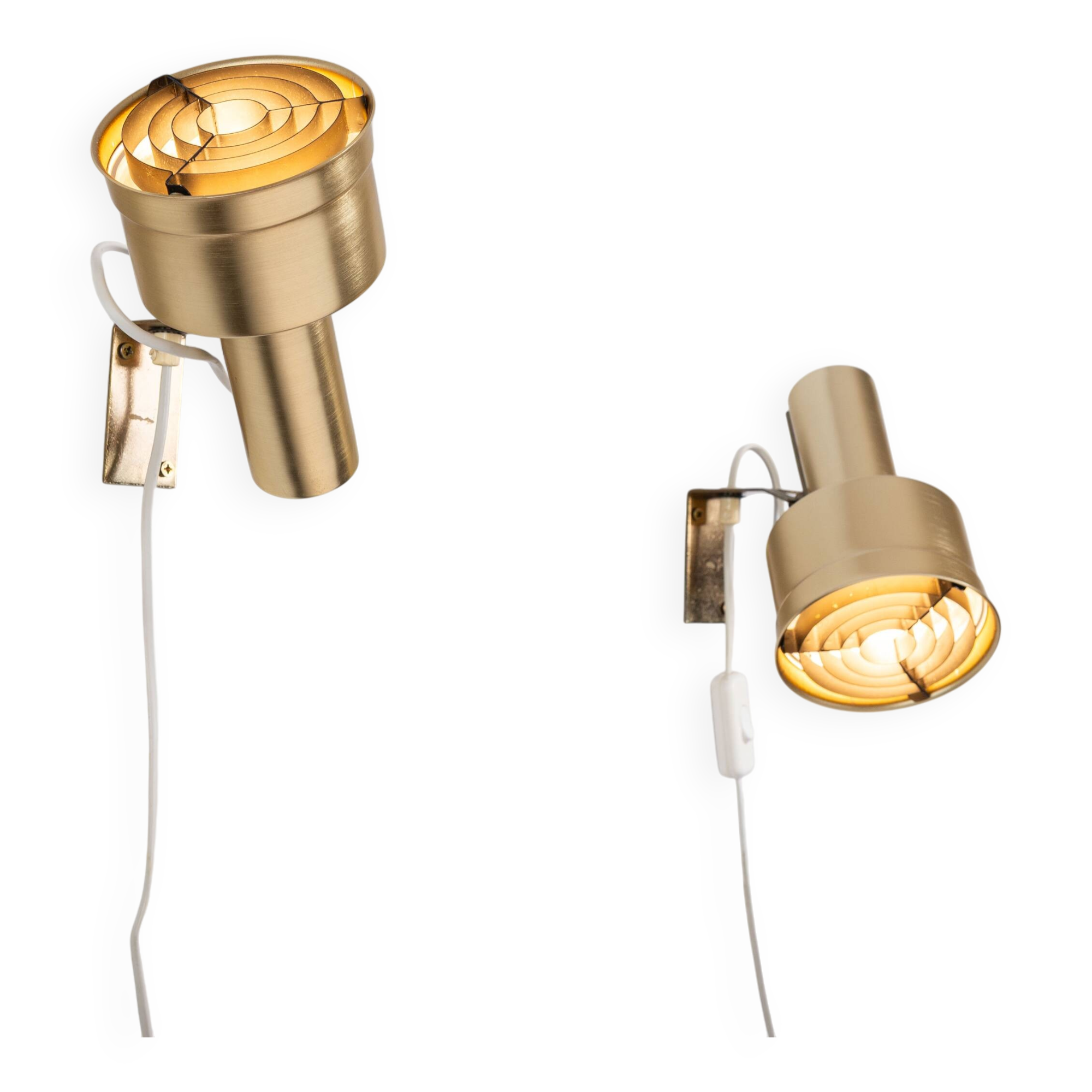 Pair of adjustable wall lamps designed by Per Sundstedt for Kosta Lampan