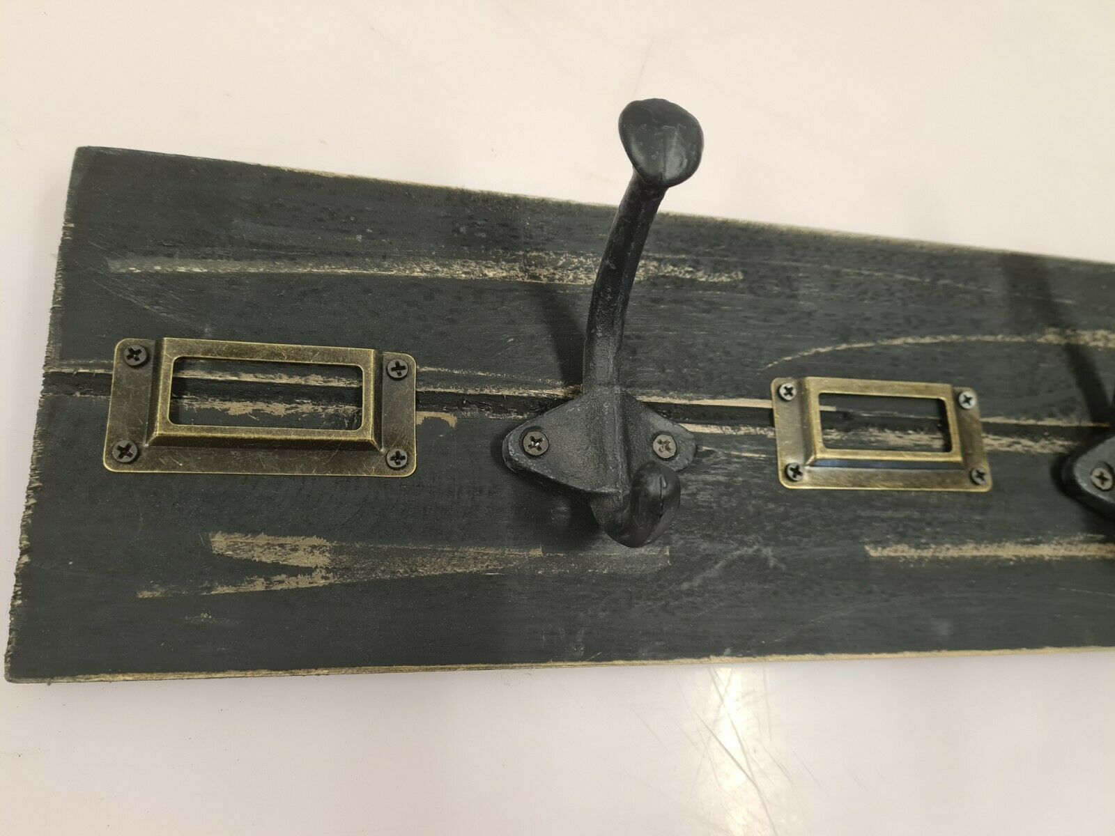 School coat rack with black patinated labels