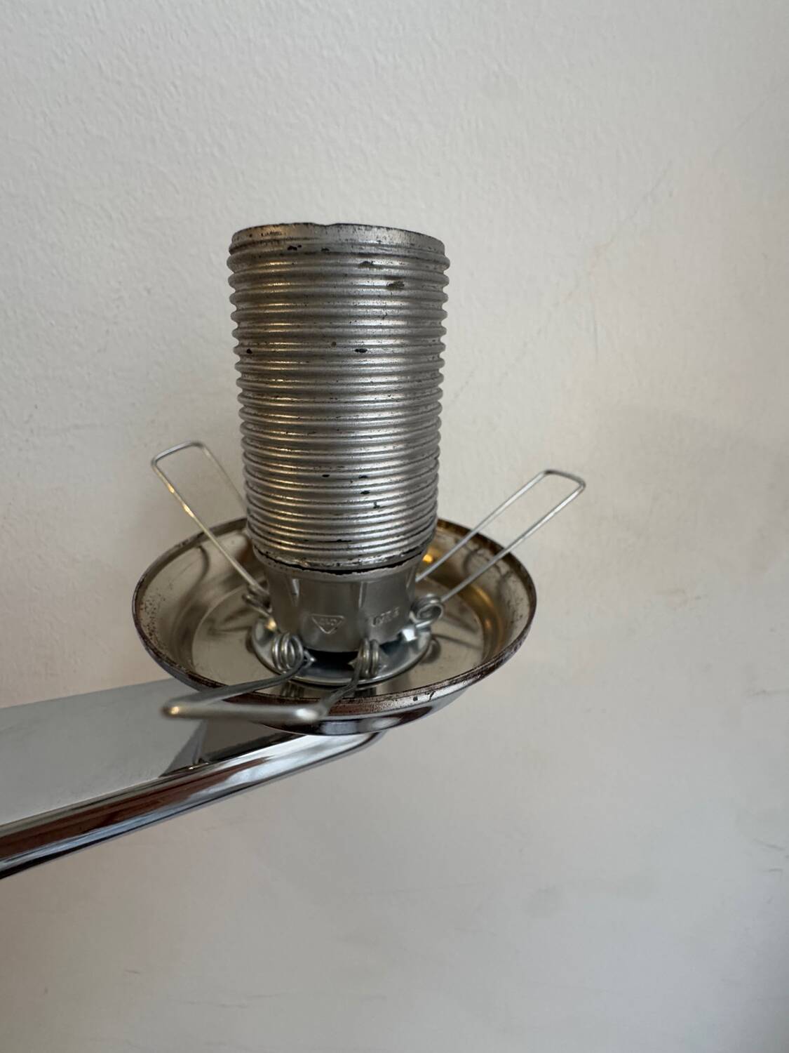 Chrome and opaline wall lights from the 70s.