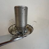 Chrome and opaline wall lights from the 70s.