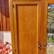 Vintage wardrobe with mirror and tapered legs.