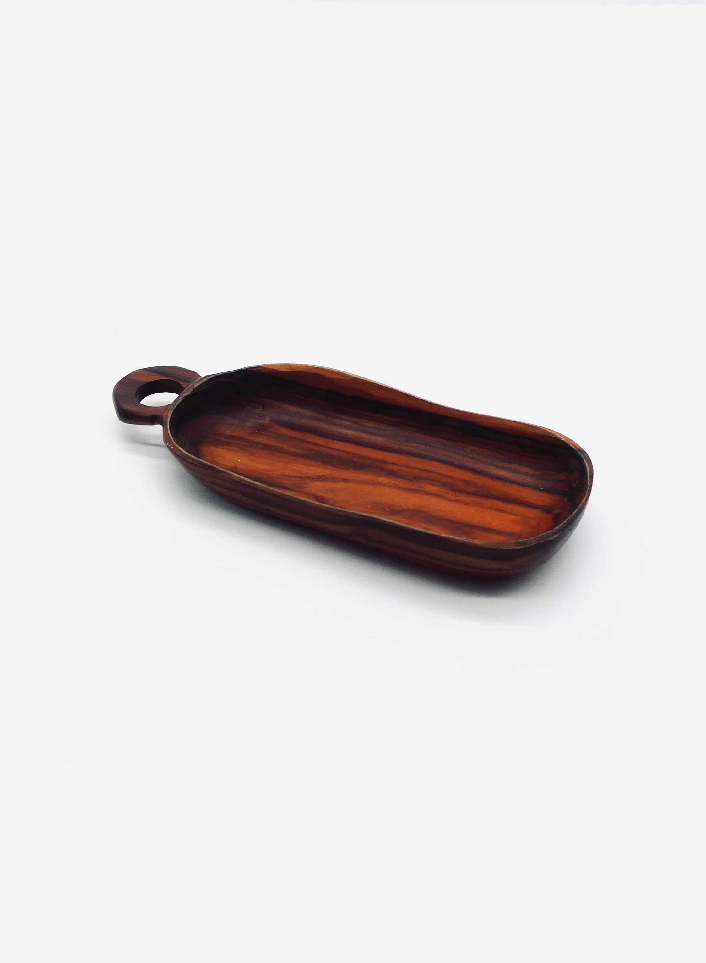 Empty pocket in olive wood