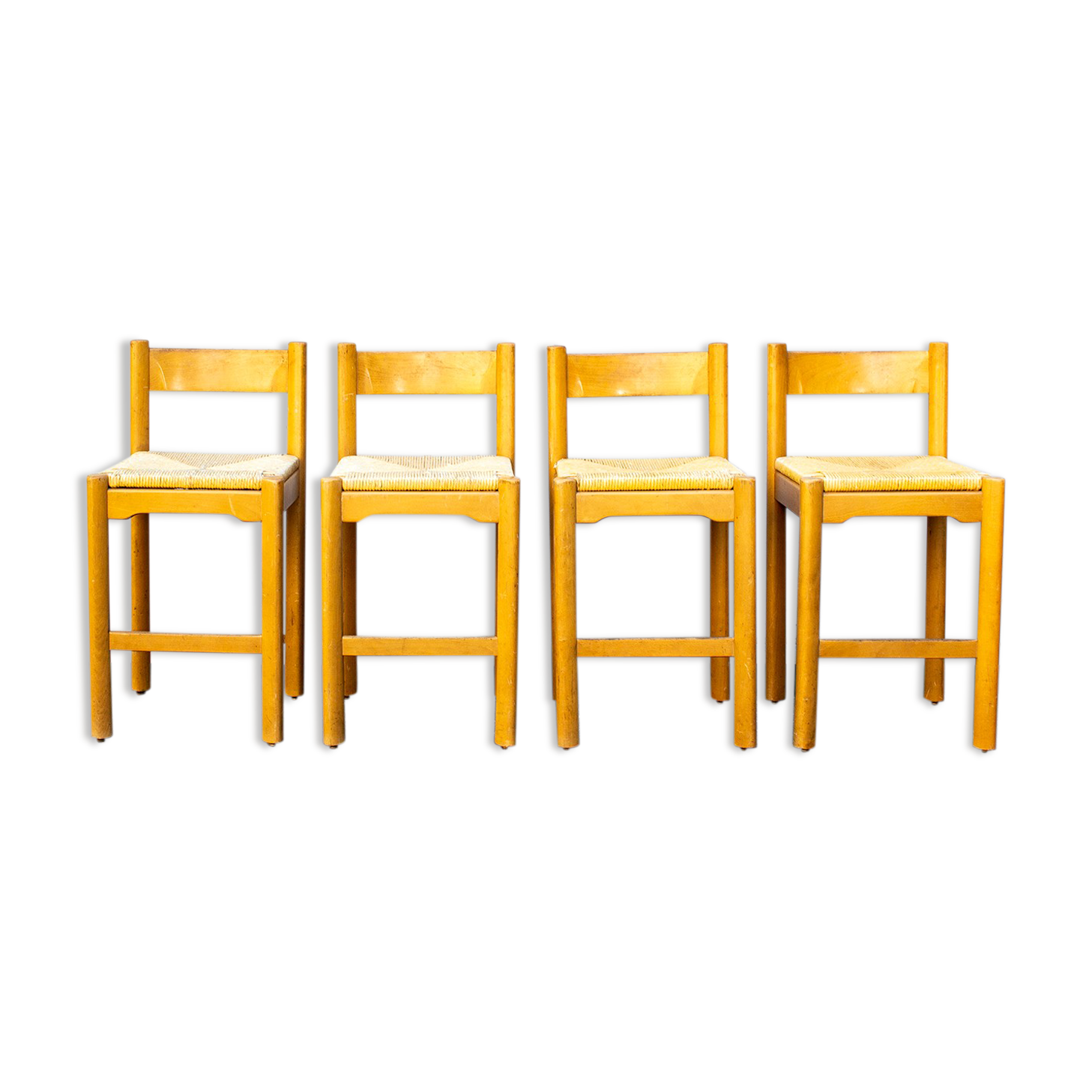 Four wooden and straw stools 70