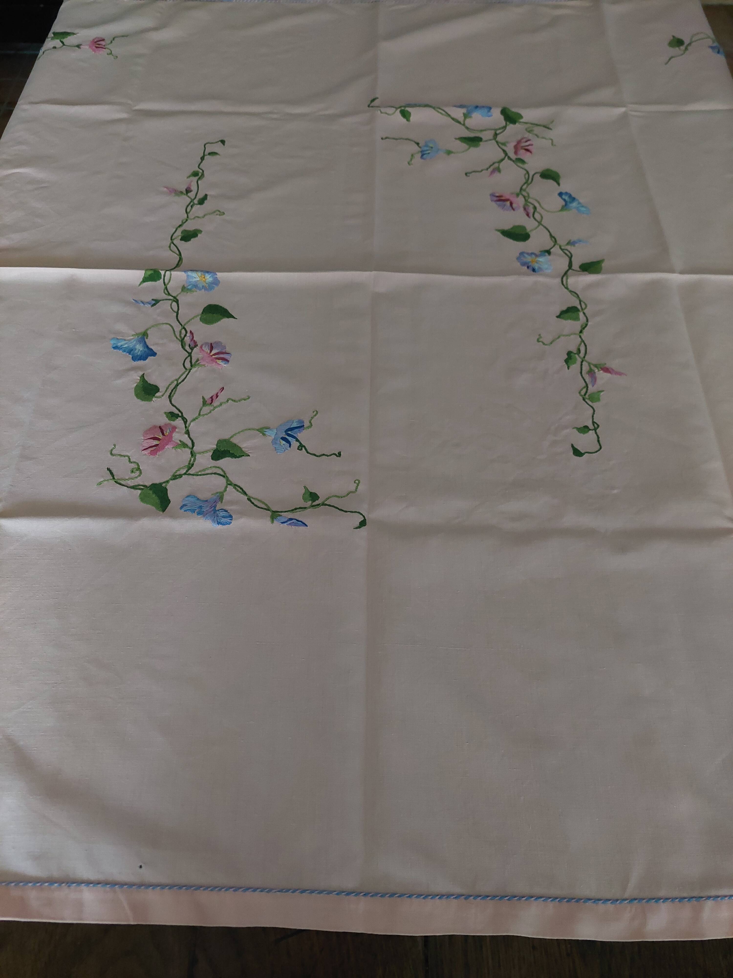 Antique pink cotton tablecloth with embroidered multicolored flowers