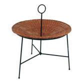 Curved table, wicker and black lacquered brass magazine rack, 1960.