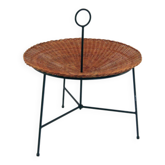 Curved table, wicker and black lacquered brass magazine rack, 1960.