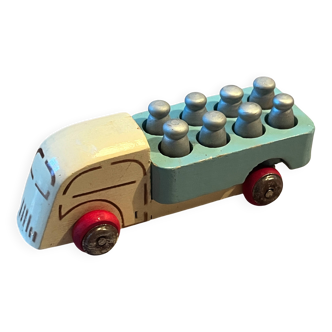 Small wooden milk truck with its cans, antique toy