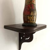 small old openwork wooden wall shelf