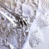 Ice cube pliers or sugar in's feet chiseled silver metal and punches