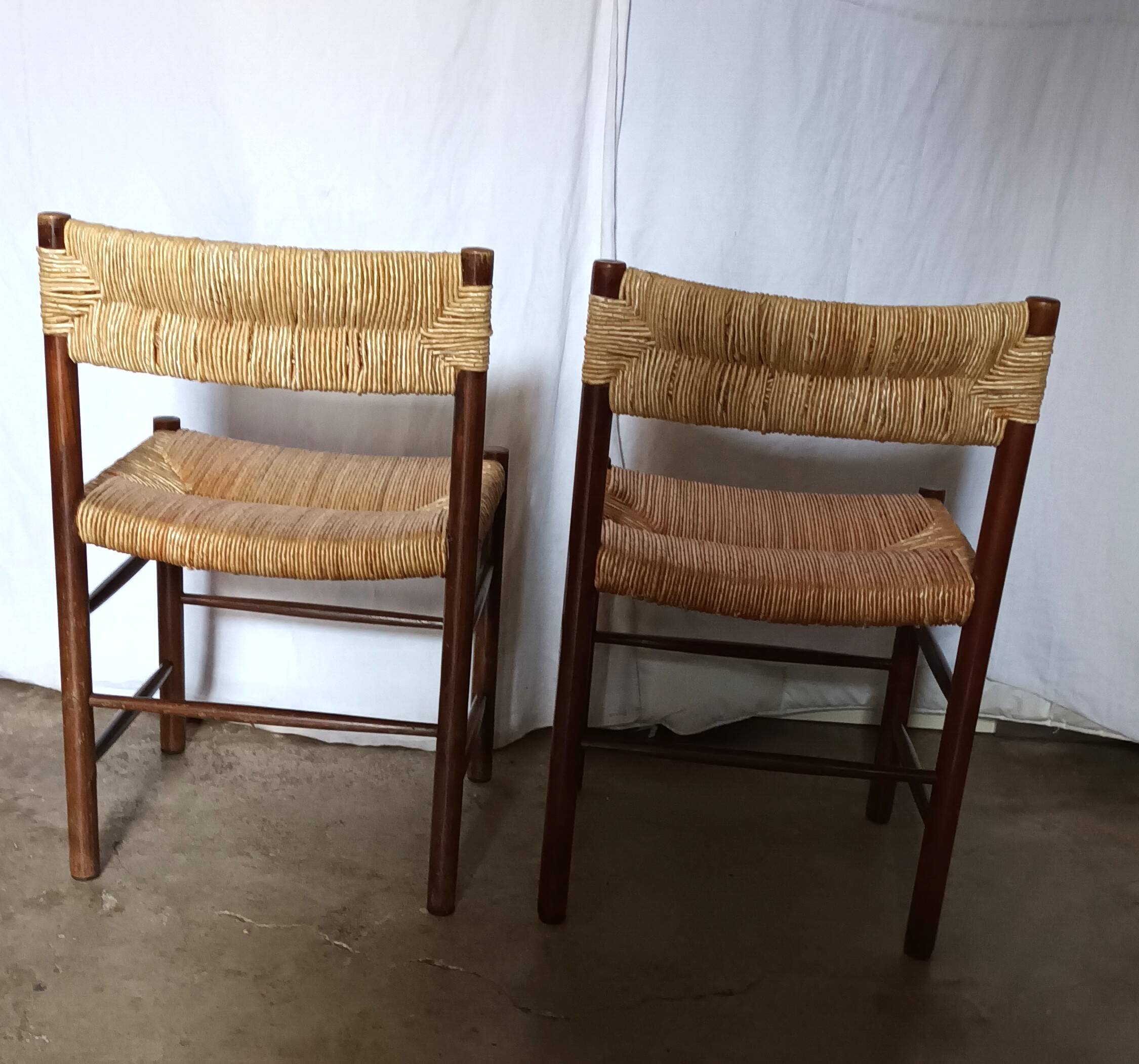 Pair of "Dordogne" chairs by Charlotte Perriand from the 1950s.