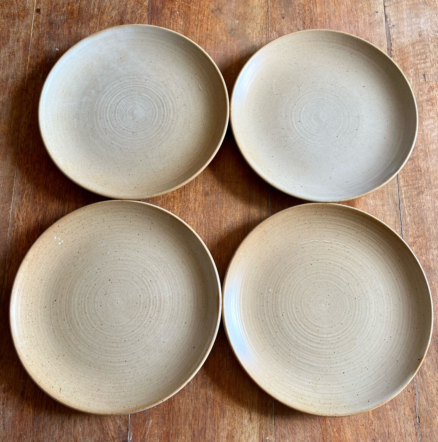 Set of four vintage stoneware plates