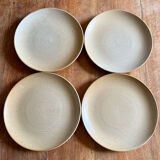 Set of four vintage stoneware plates