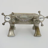 Old bathtub faucet, kitchen in silvered bronze with its shell-shaped soap dish