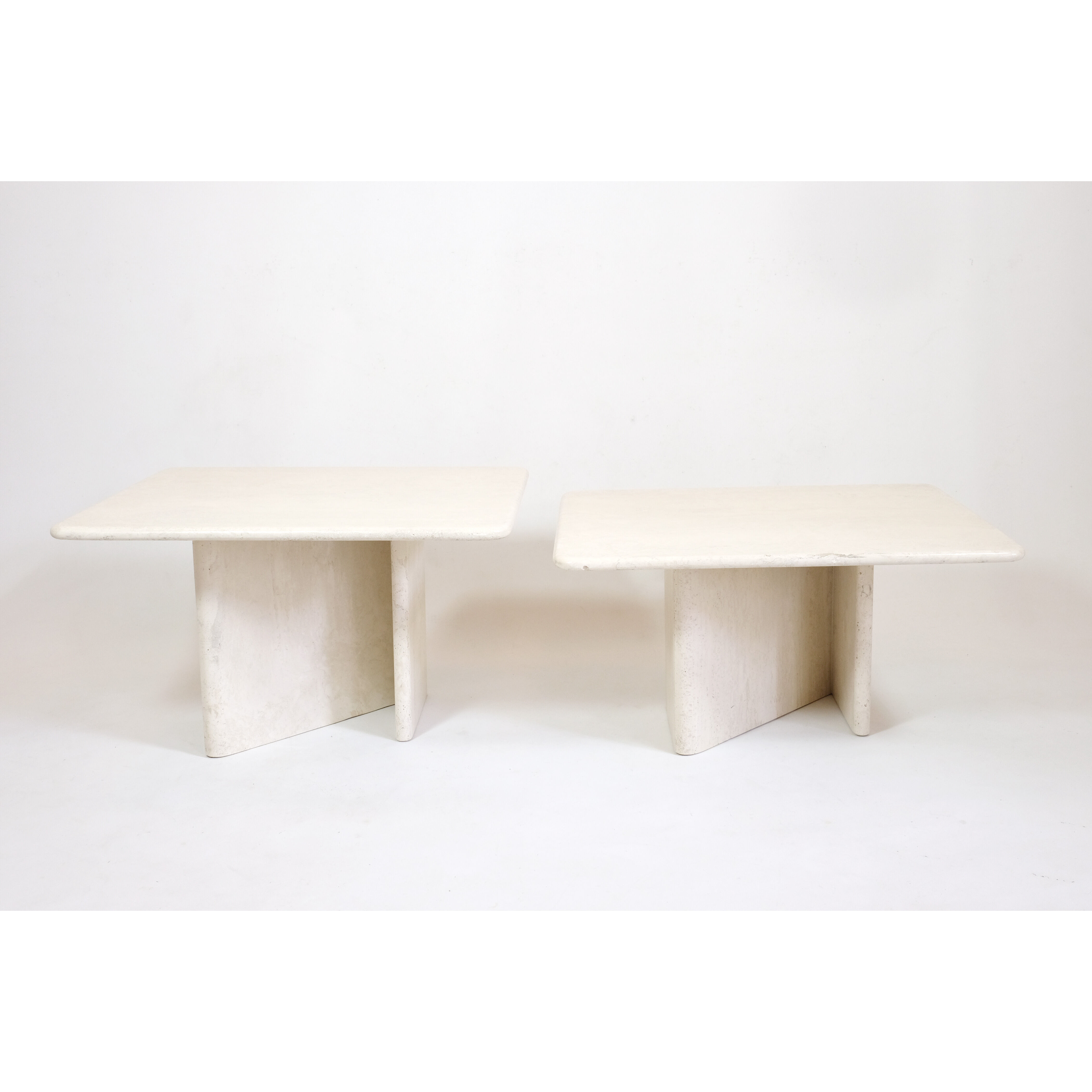 Pair of travertine trundle tables, Italy