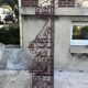 Old baker's grid, dating back to the early 20th century, made of wrought iron and brass