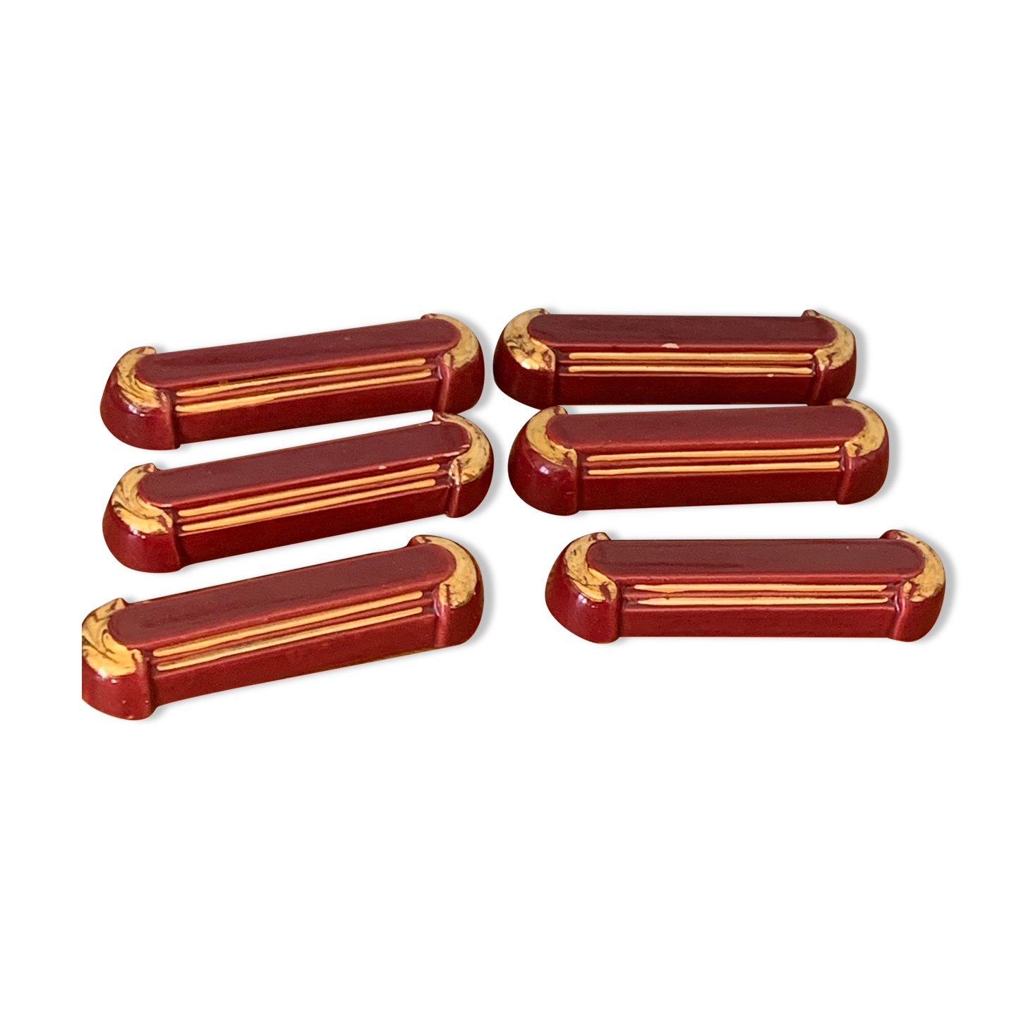 6 knife holders in burgundy glazed ceramic with art deco gold edging