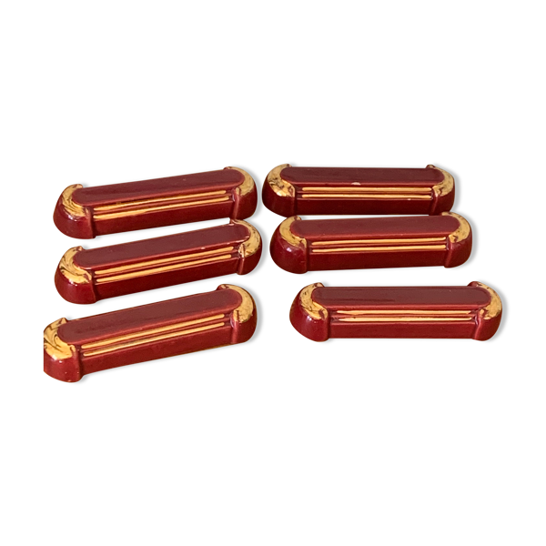 6 porte-couteaux en céramique émaillée bordeaux et liseré or art deco