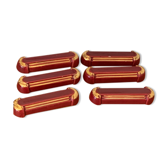 6 knife holders in burgundy glazed ceramic with art deco gold edging