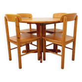 Suite d’une table ronde avec rallonge et 4 chaises vintage en pin des années 60 70