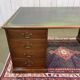 Large English flat desk in mahogany with leather top, early 20th century