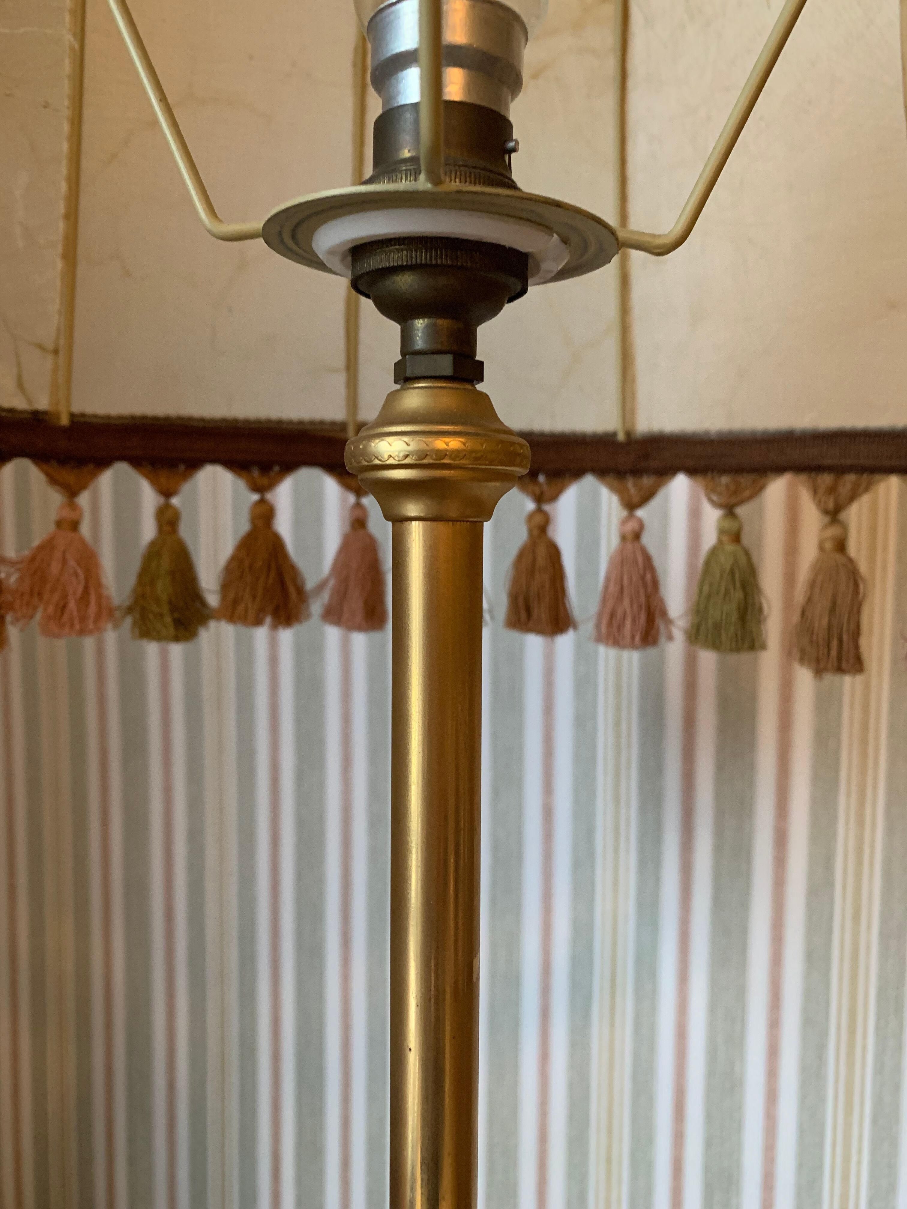 Tripod floor lamp brass