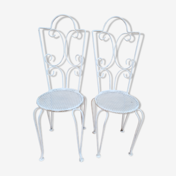 Pair of antique wrought iron garden chairs