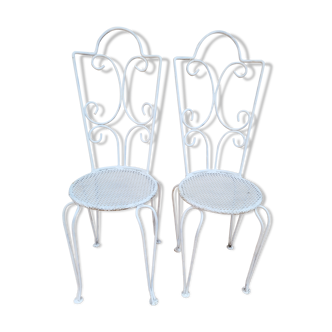 Pair of antique wrought iron garden chairs