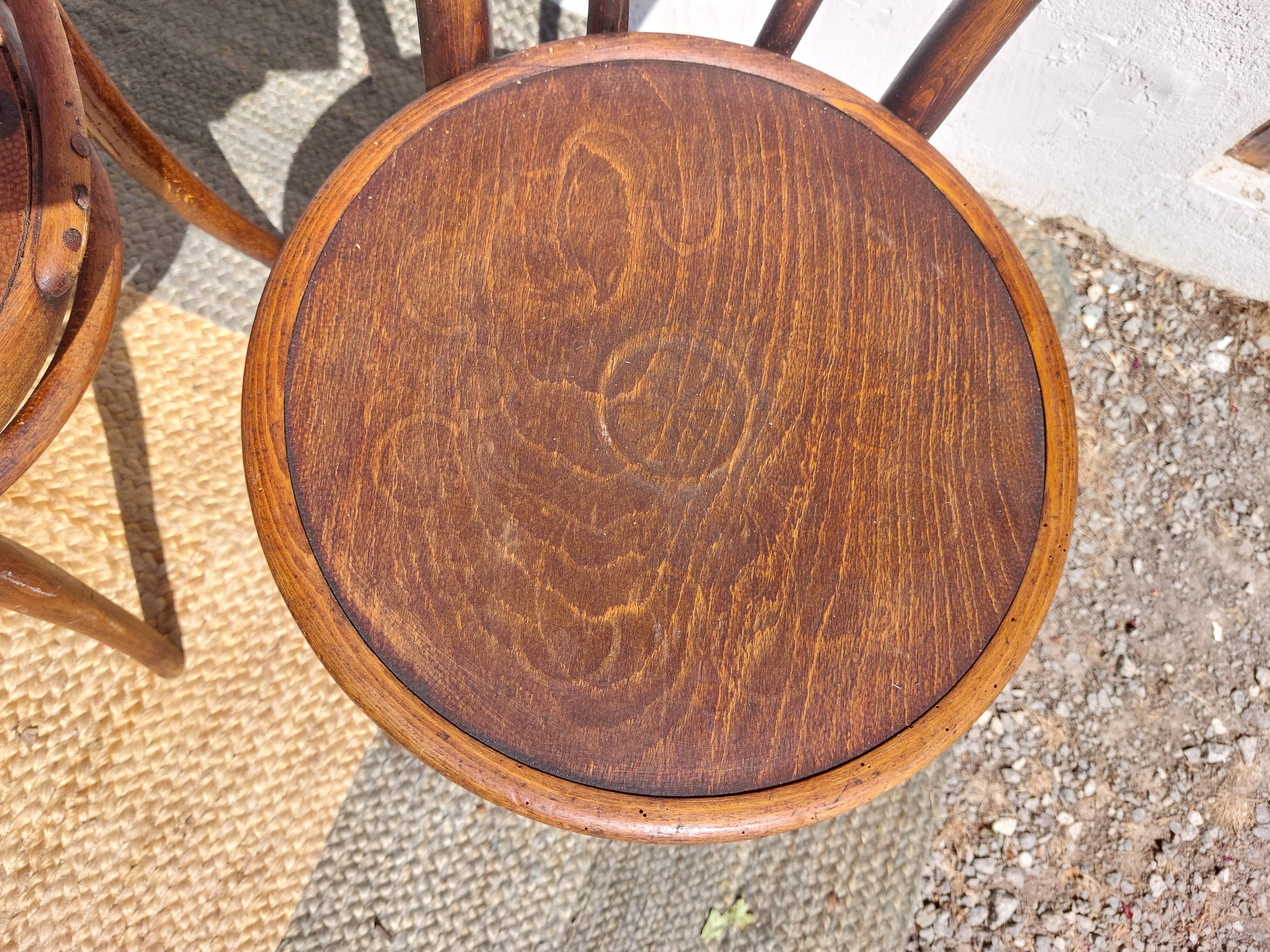 4 curved wooden bistro chairs