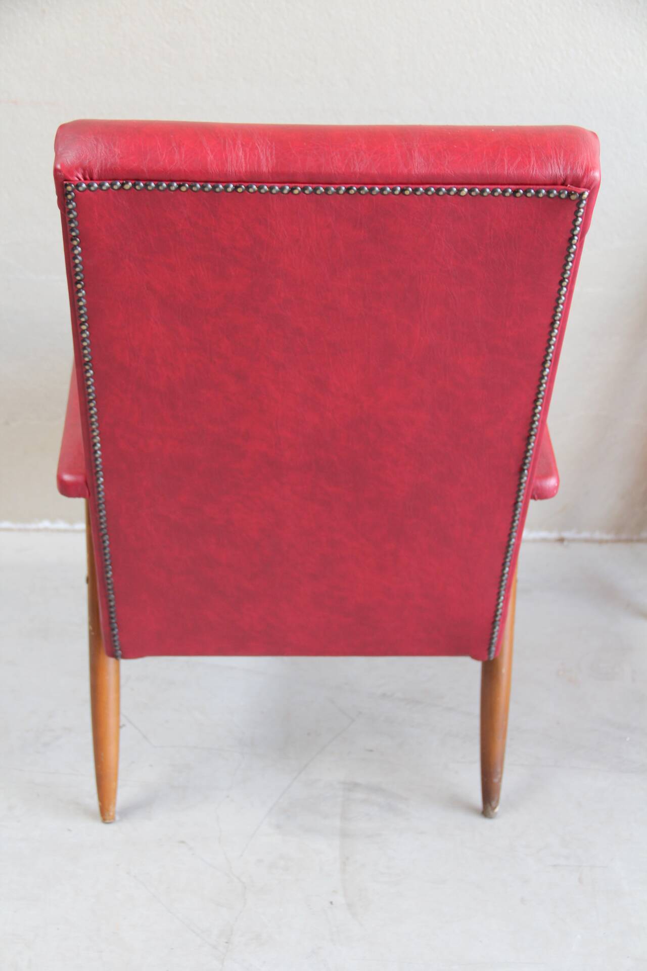 Fauteuil vintage en skaï rouge