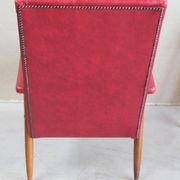 Vintage armchair in red leatherette