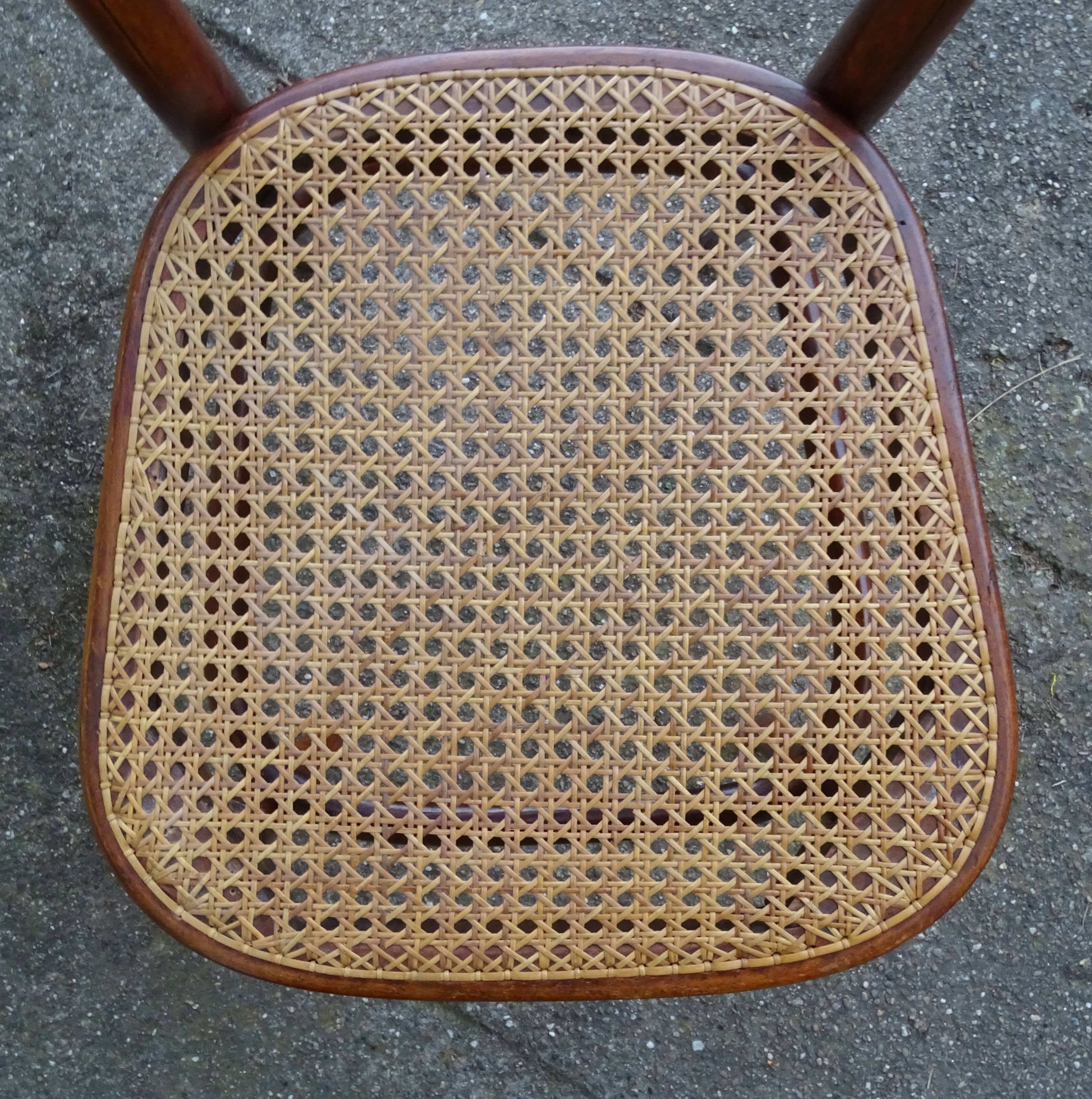 2 Thonet N°221 chairs, caned Art Nouveau bronze decor