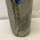 Artisanal vase in gray sandstone flower pattern