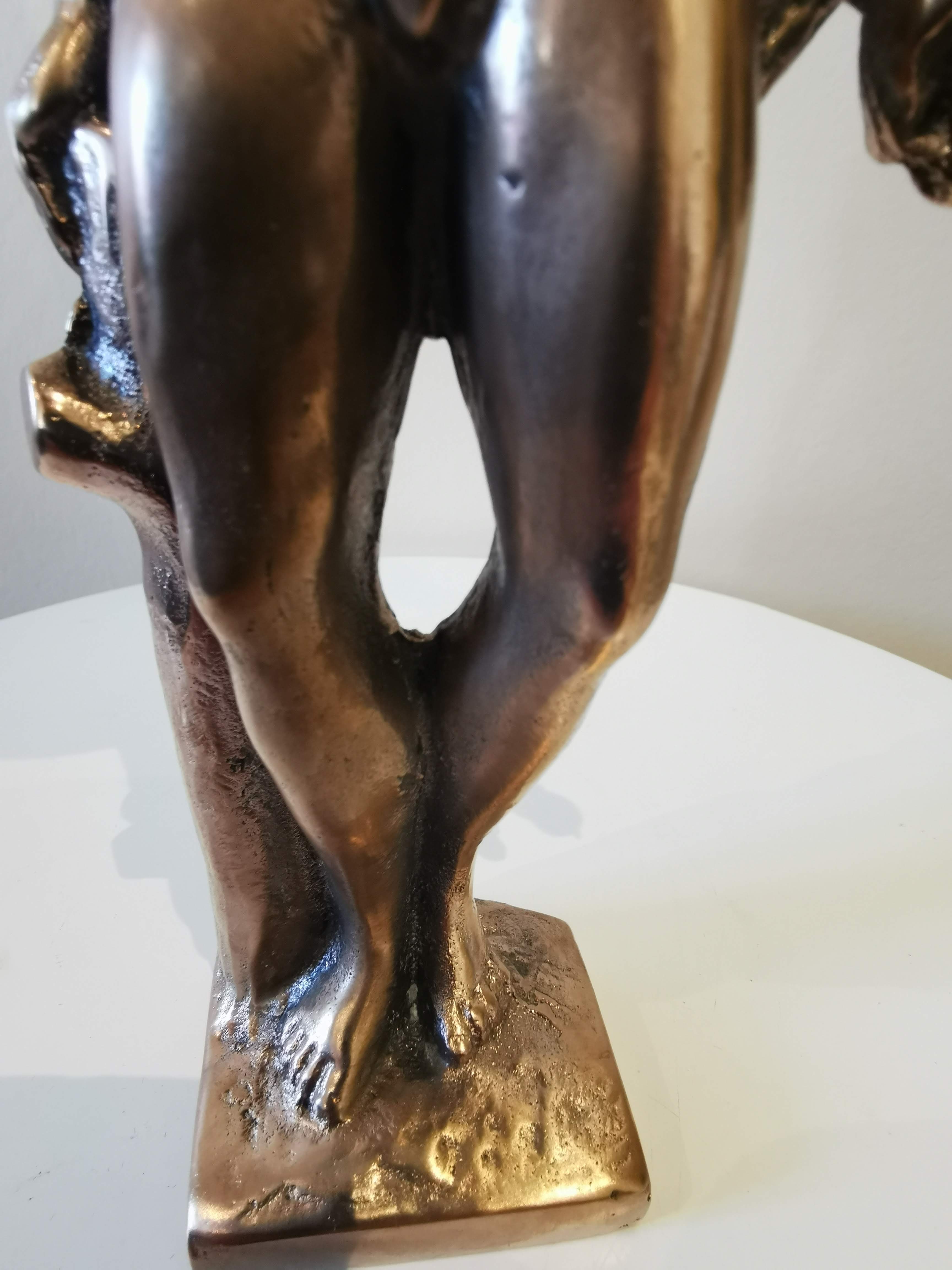 Large kerosene lamp mounted on bronze statue. Late nineteenth century