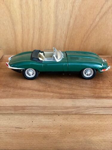 Miniature green Jaguar car