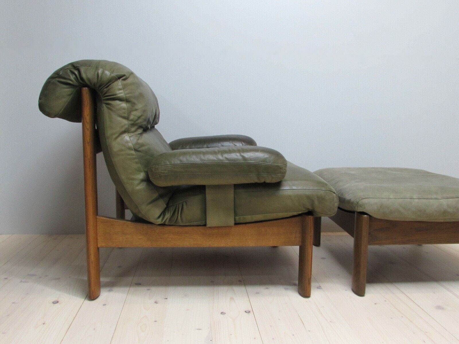 Armchair and footstool - green leather - 1960s