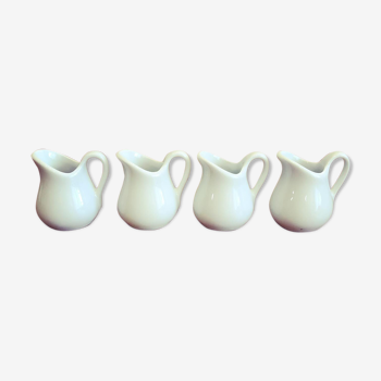 4 porcelain milk pots