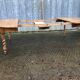 Round table in solid cherry wood, extendable with twisted legs, Louis Philippe style.