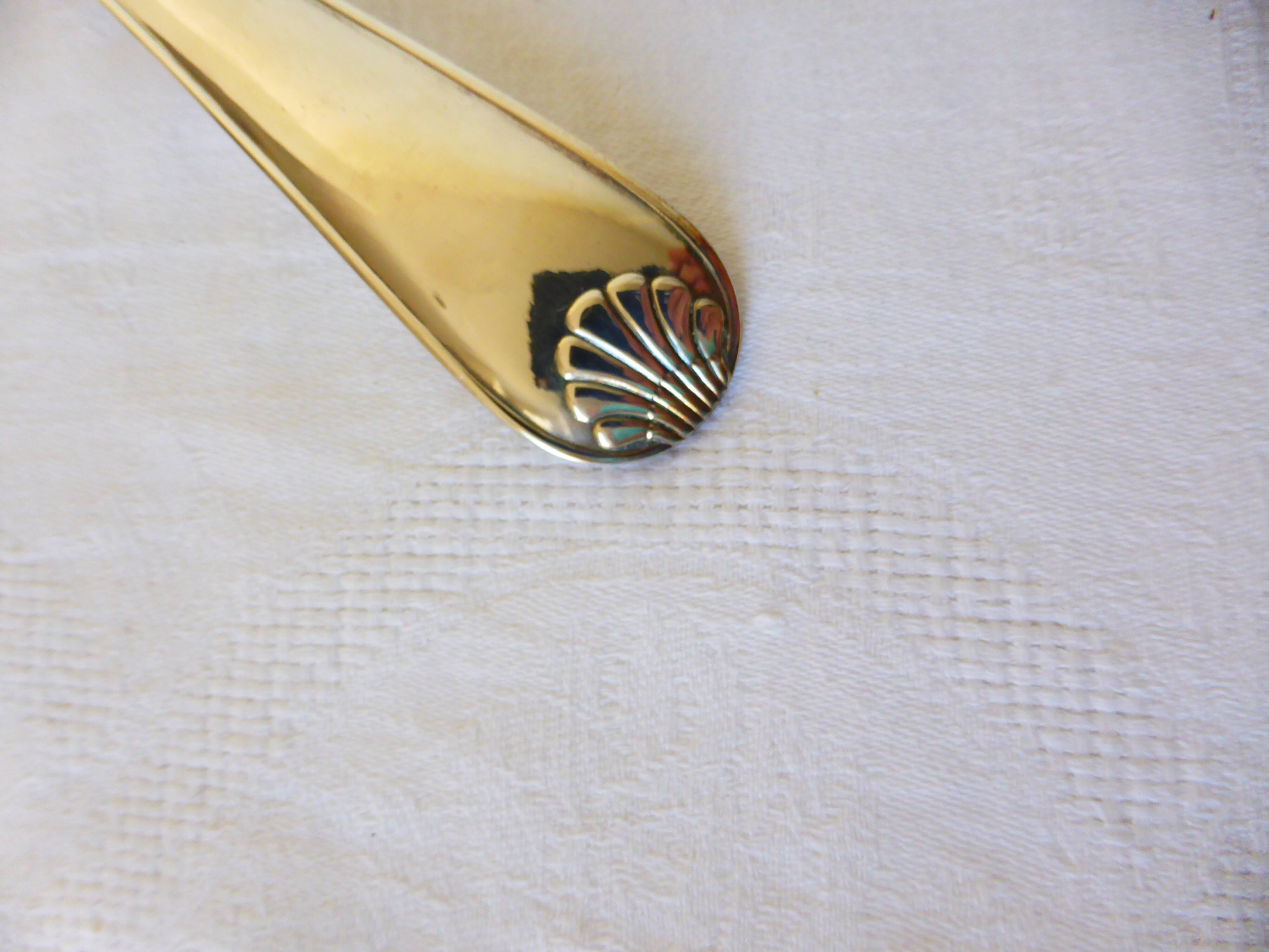 1 silver-plated metal ladle stamped 2106248