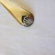 1 silver-plated metal ladle stamped 2106248