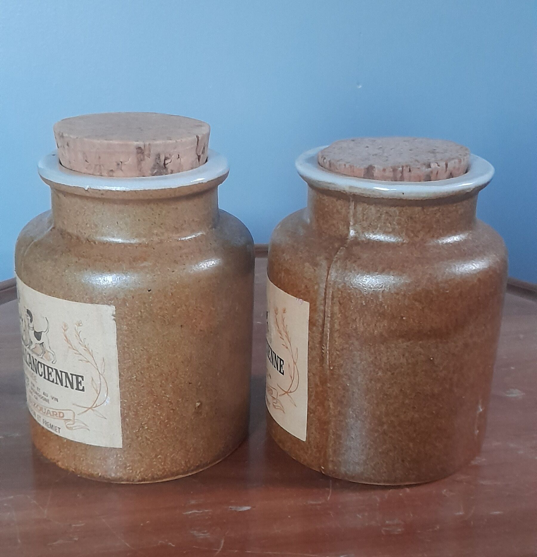 Duo of glazed stoneware mustard pots with label and corks, armand bizouard, amora, 1950